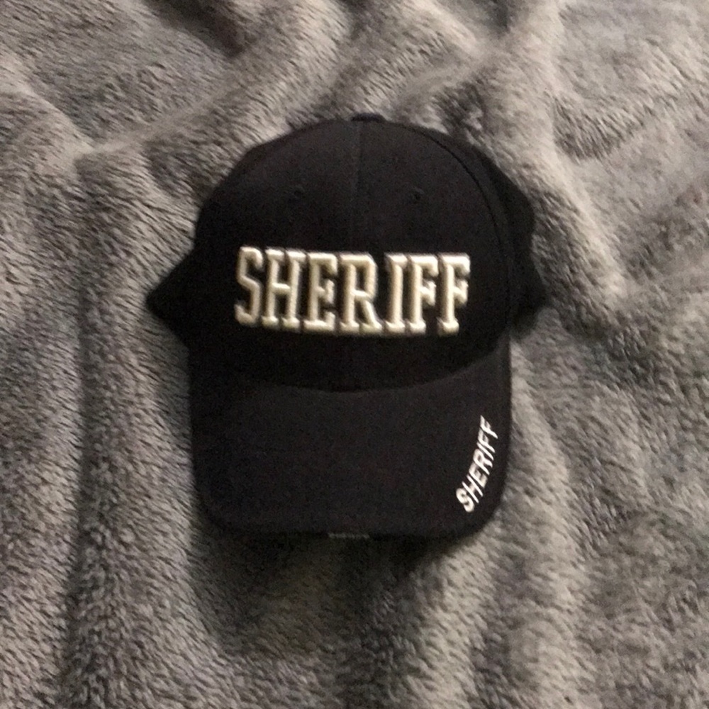 Justice wear Sheriff cap